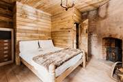 As you head up the stairs you will find the two bedrooms. This is the main bedroom with a comfy double bed.
