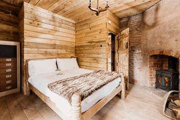 As you head up the stairs you will find the two bedrooms. This is the main bedroom with a comfy double bed.