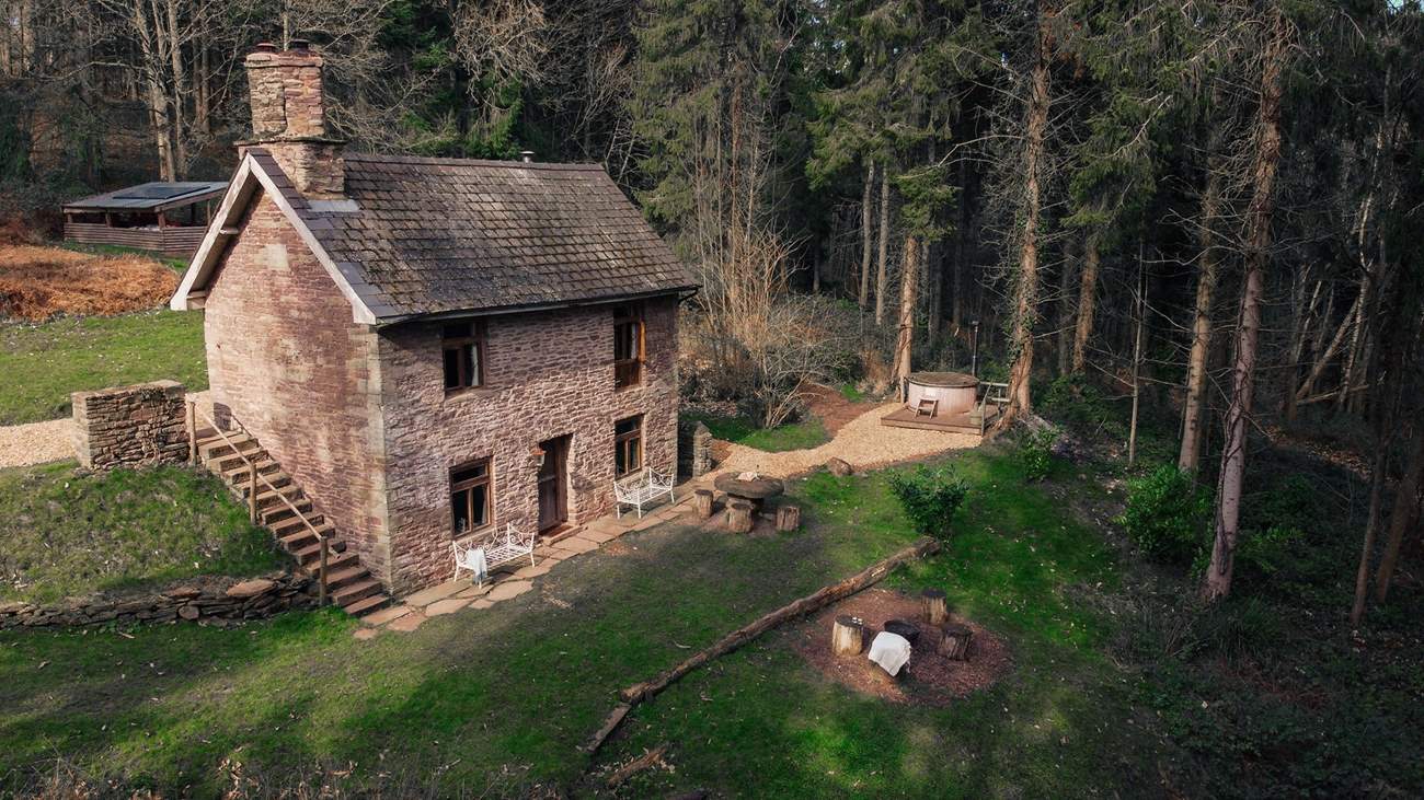 The structure itself is incredible and the location is just a dream. Behind Mrs Higgs is the well-stocked wood store.