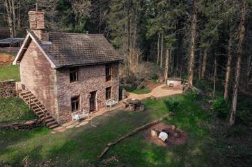 The structure itself is incredible and the location is just a dream. Behind Mrs Higgs is the well-stocked wood store.