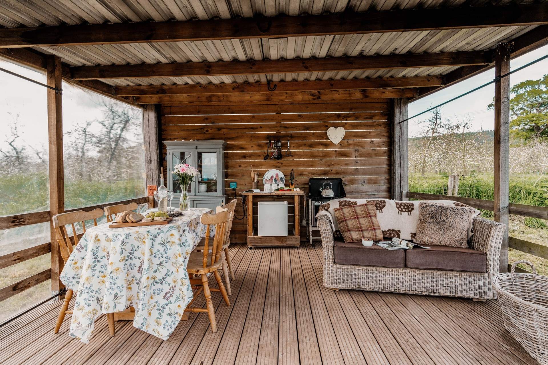 The quirky outdoor kitchen is a lovely place to cook, dine and  relax.
