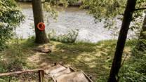 Head down to your own private spot by the river.