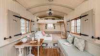 Inside the hut, you will be greeted with lovely countryside charm.