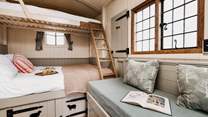 The top bunk bed and sofa can be made up as two single bed upon request.