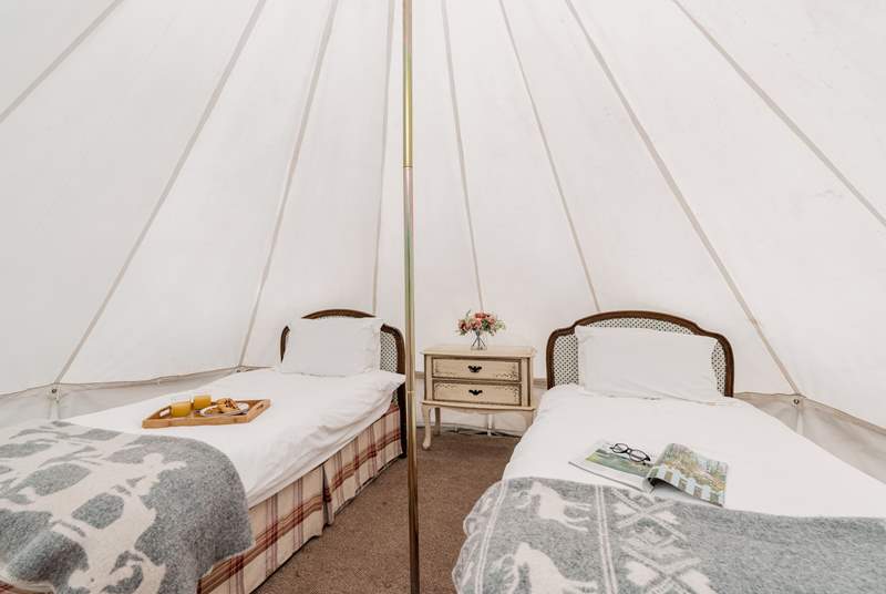 You'll find two single beds in the bell tent.