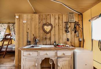 The kitchen area pays respect to a traditional style of glamping.
