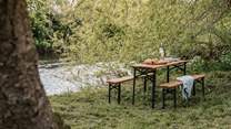 Dine in the wild, listening to the gentle flow of the River Wye.