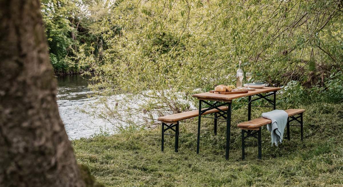 Dine in the wild, listening to the gentle flow of the River Wye.