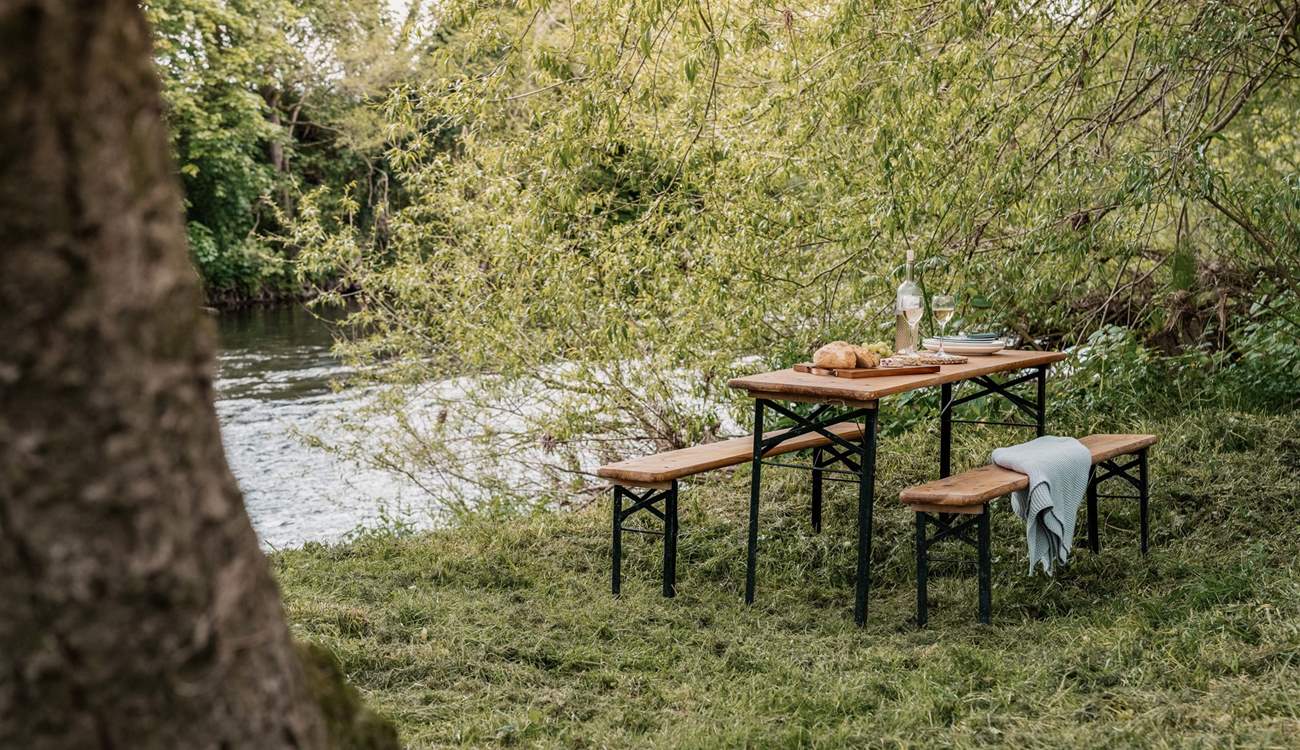 Dine in the wild, listening to the gentle flow of the River Wye.