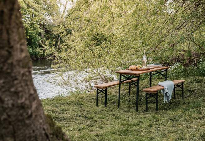 Dine in the wild, listening to the gentle flow of the River Wye.