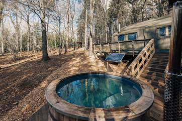 This army style safari tent offers the most unique glamping experience without compromising the luxuries.