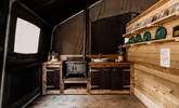 Cook up some holiday delights over the wood-burning stove. - Thumbnail Image