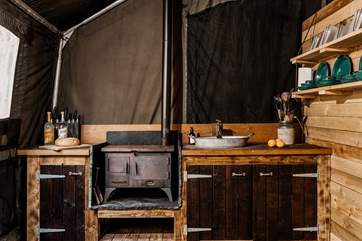 The kitchen is superbly equipped with upcycled army equipment!