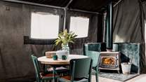 The warming wood-burner will keep you nice and toasty on those cooler eves.