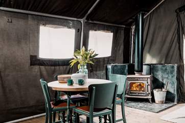 The warming wood-burner will keep you nice and toasty on those cooler eves.
