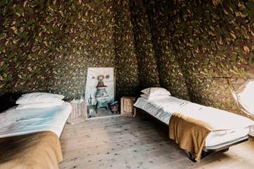 Inside, you will find two single beds and a characterful wood-burner.