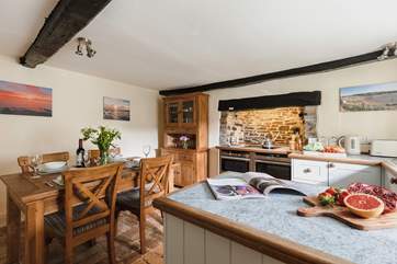 The characterful kitchen/diner is perfect for sociable holidays.
