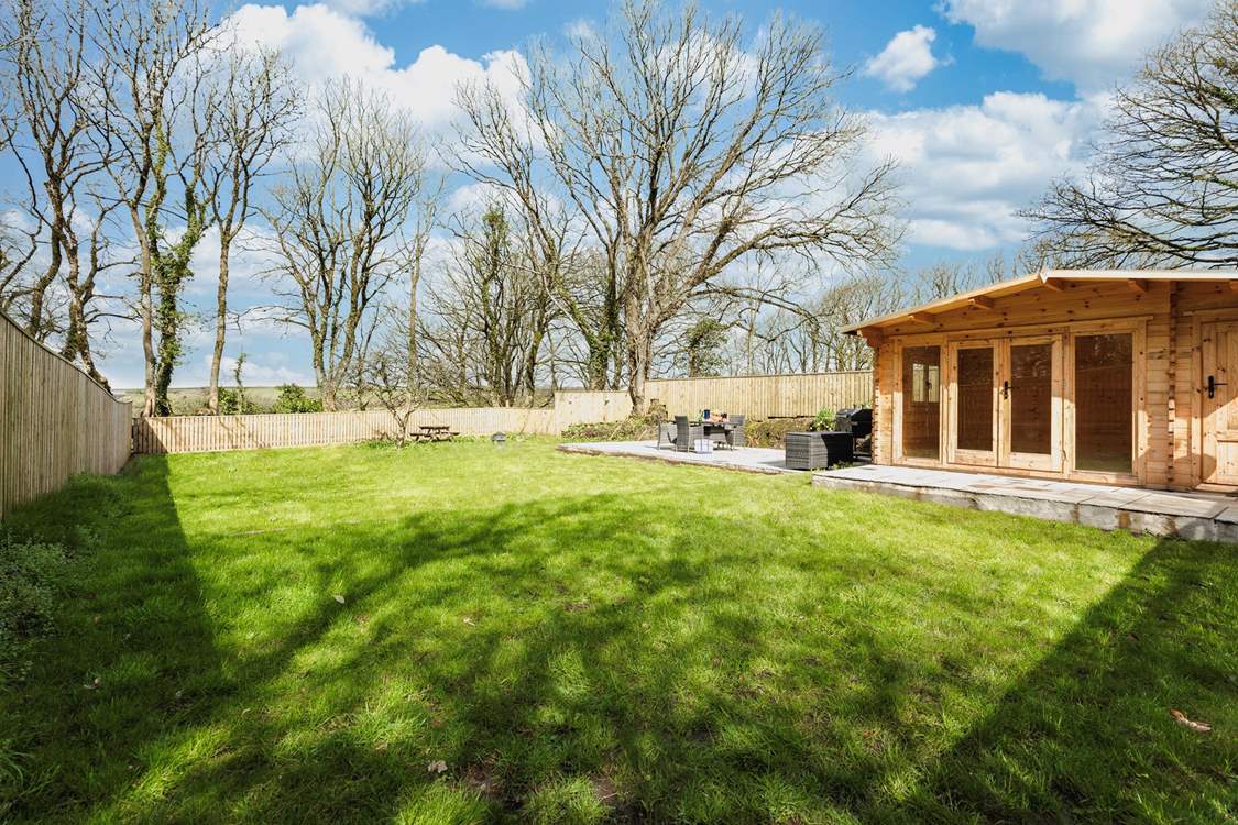 Oodles of space for everyone in the fabulous garden. Please note the summer-house is not for guests' use.