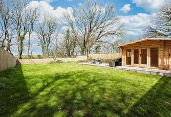 Oodles of space for everyone in the fabulous garden. Please note the summer-house is not for guests' use. 