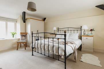 Gorgeous neutral tones in bedroom one.