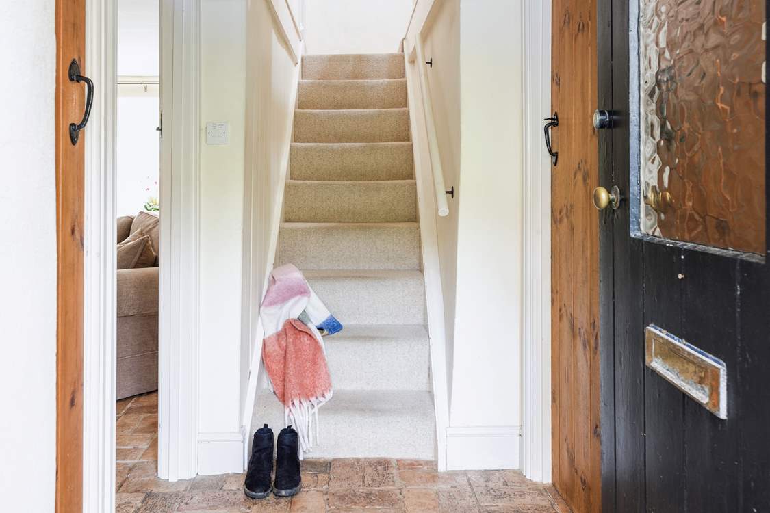 Throughout the ground floor there is a fabulous reclaimed brick floor with under-floor heating. Both the sitting-room and kitchen/diner are accessed from the hallway.