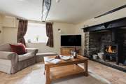 Cobble Cottage has charming traditional features such as this fabulous fireplace.