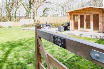 The gorgeous secluded garden is 90 yards away along a footpath and here you can relax surrounded by nature.