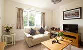 The comfortable sitting-room with Smart TV, DVD player and plenty of books and games to keep everyone entertained. - Thumbnail Image