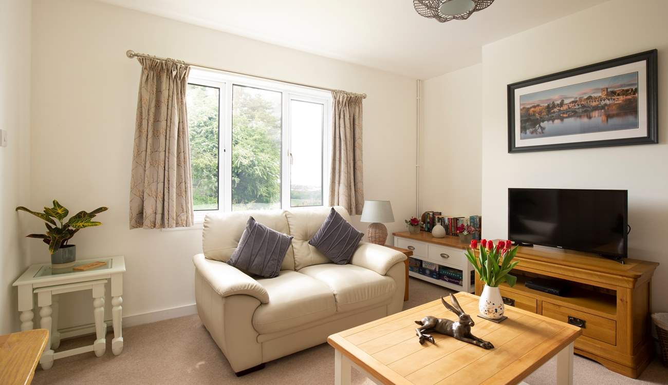 The comfortable sitting-room with Smart TV, DVD player and plenty of books and games to keep everyone entertained.