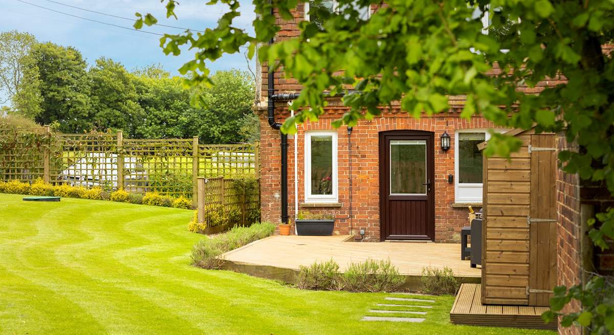 Step out of the back door onto the decking.