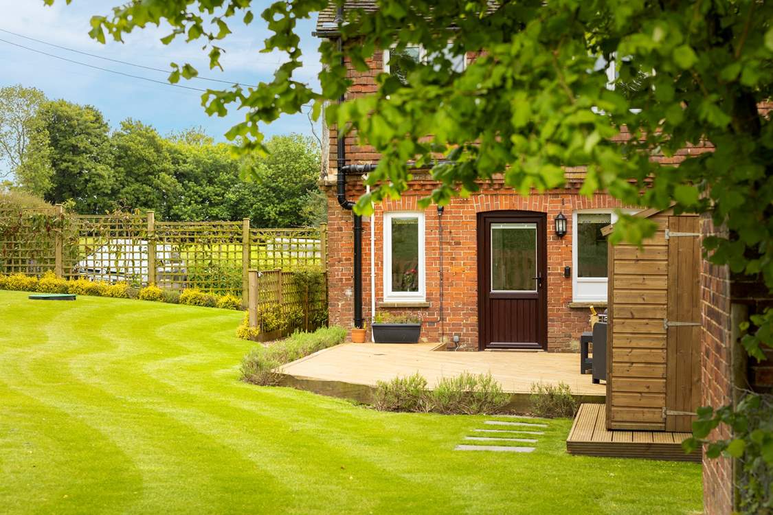 Step out of the back door onto the decking.