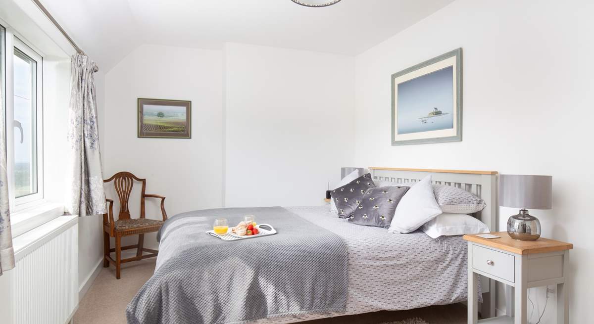 Upstairs you'll find a spacious king-size double bedroom.