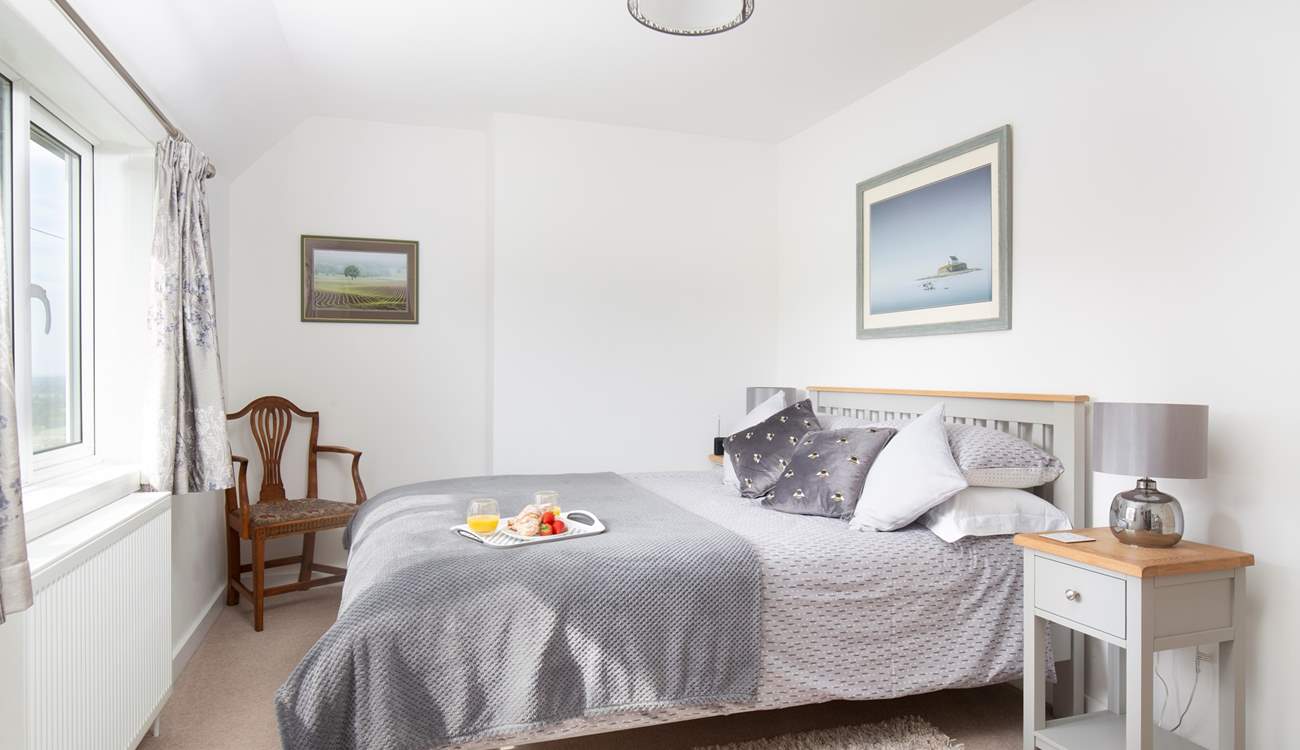 Upstairs you'll find a spacious king-size double bedroom.