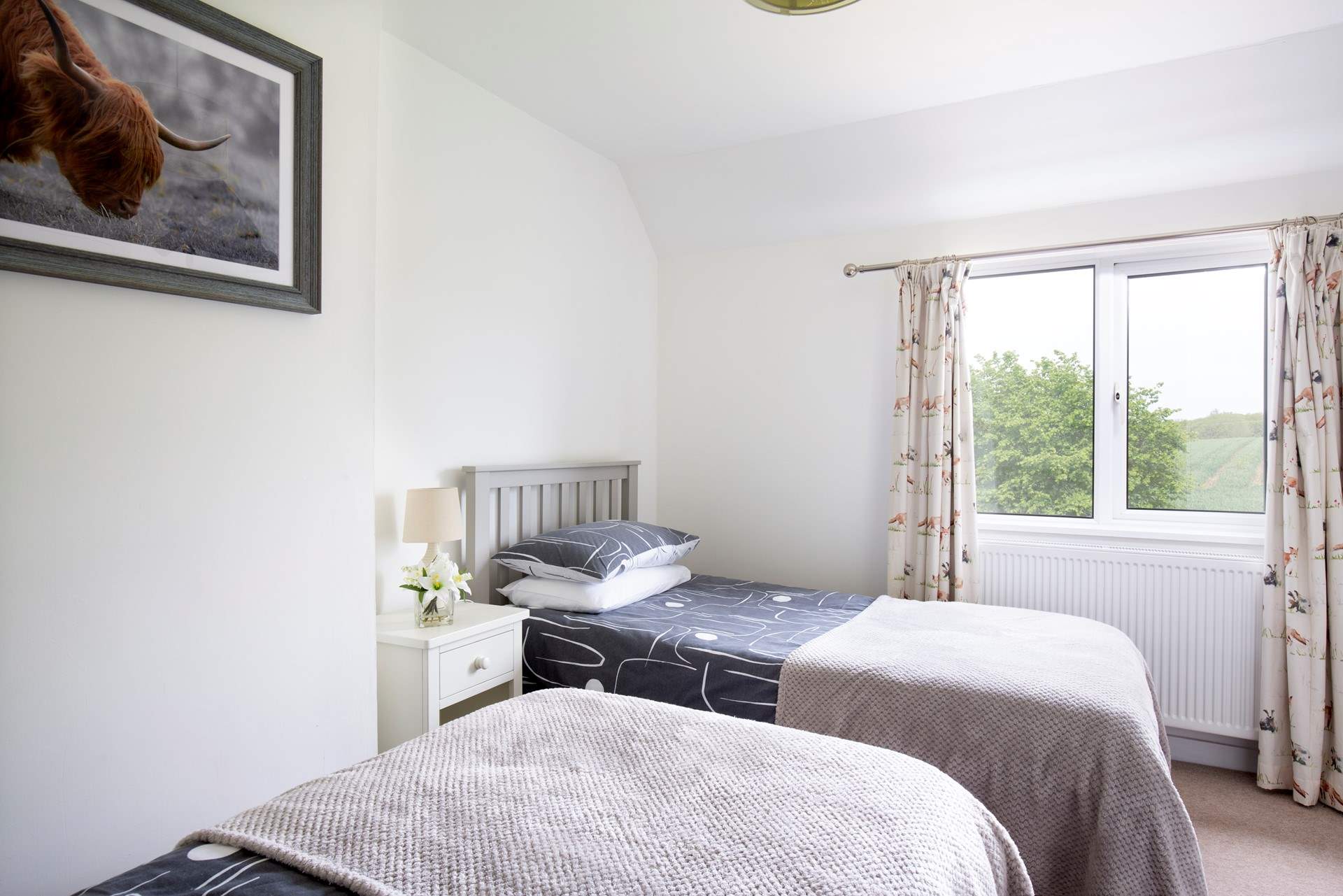 Look out onto the beautiful garden and surrounding farmland.