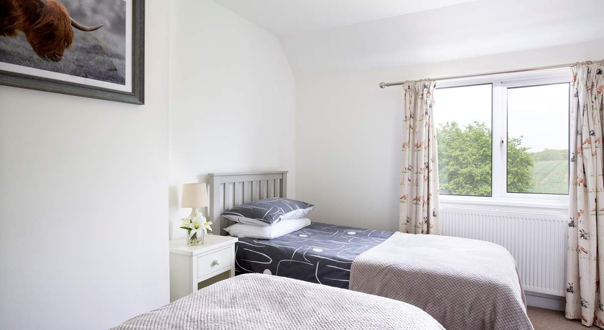 Look out onto the beautiful garden and surrounding farmland.