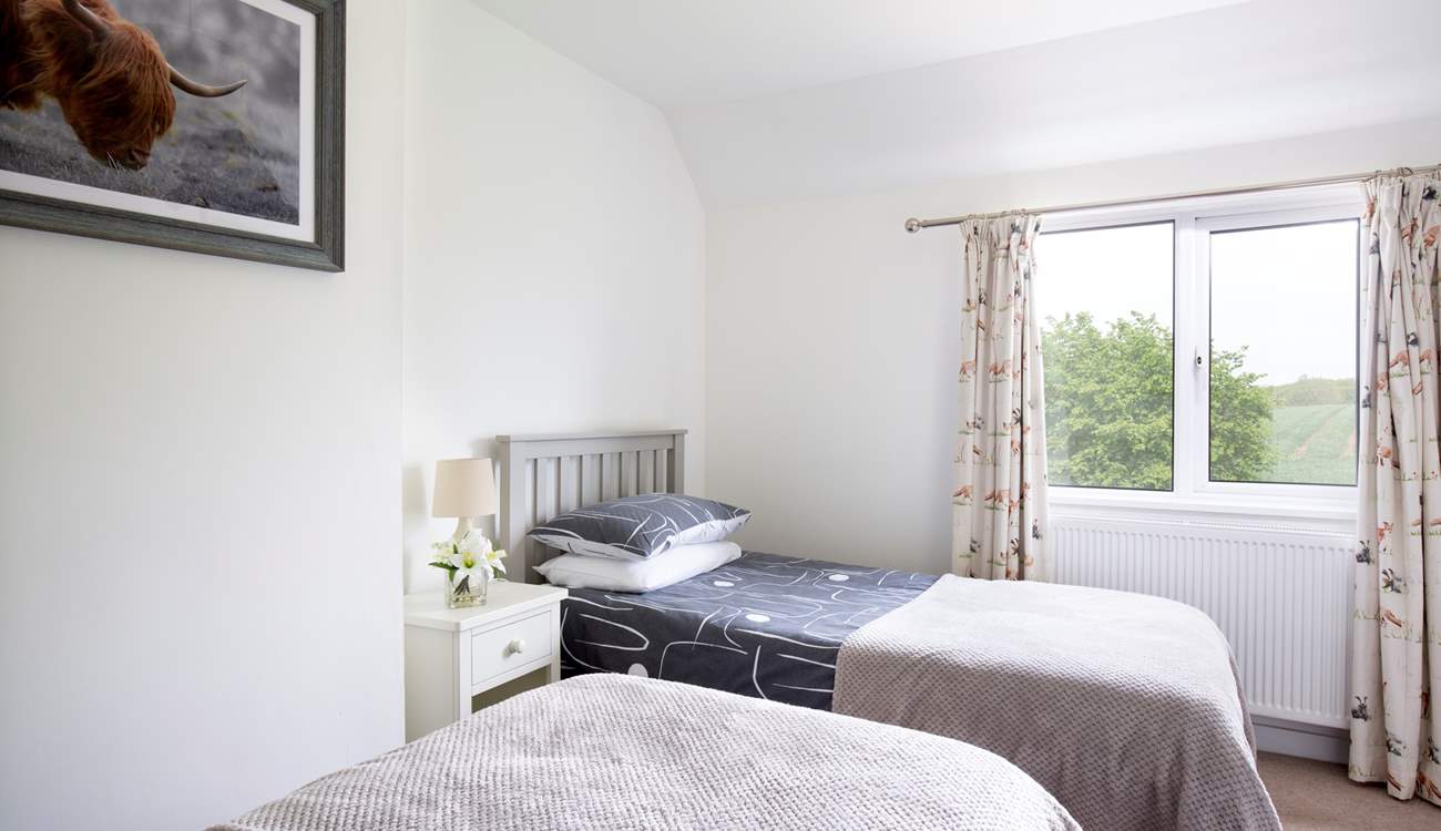 Look out onto the beautiful garden and surrounding farmland.