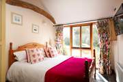 Enjoy peaceful lie-ins in this cosy double bedroom.