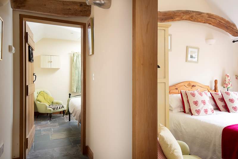 The hall leads to the double and twin bedrooms.