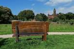 Sit and contemplate from the wooden bench Quarr Abbey in the distance.
