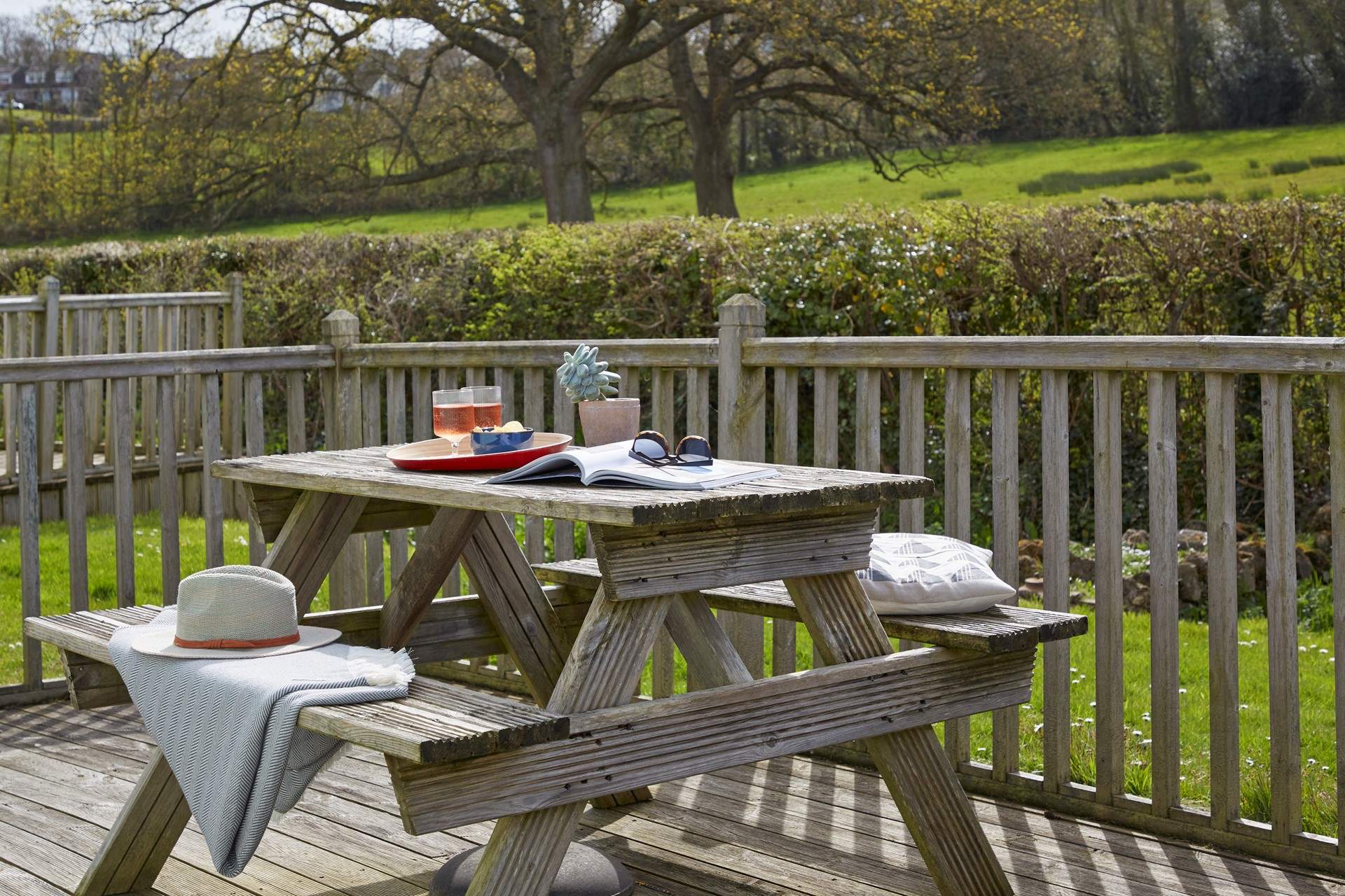 Enjoy the Island sunshine on the deck to the rear of Berry Cabin.