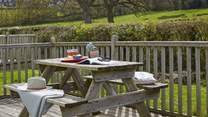 Enjoy the Island sunshine on the deck to the rear of Berry Cabin.