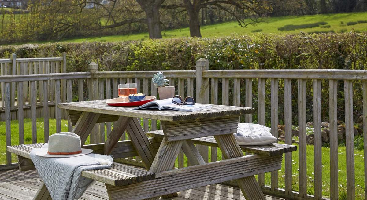 Enjoy the Island sunshine on the deck to the rear of Berry Cabin.