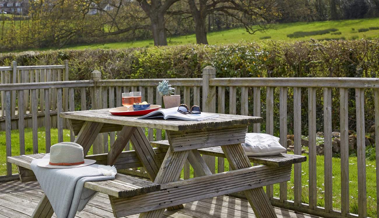 Enjoy the Island sunshine on the deck to the rear of Berry Cabin.