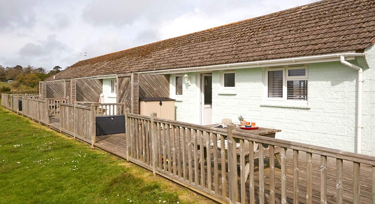 Berry Cabin sits in a row of similar properties. 