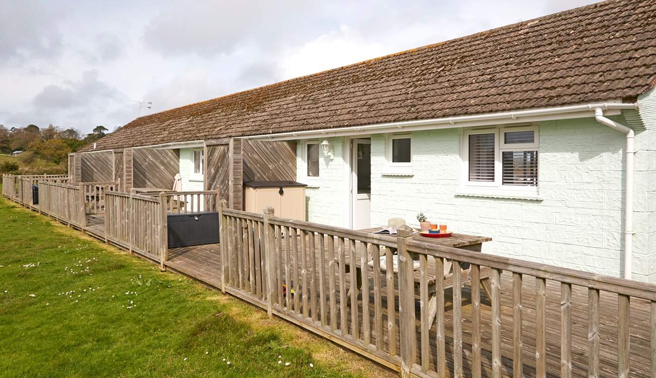 Berry Cabin sits in a row of similar properties. 
