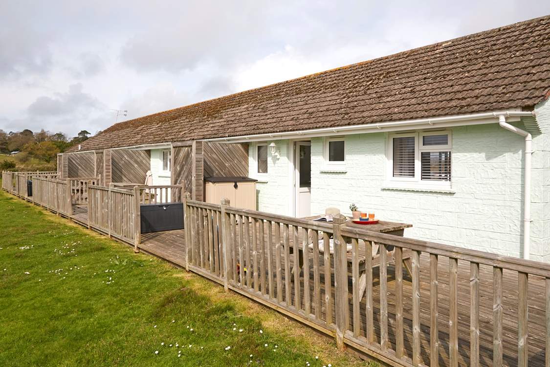 Berry Cabin sits in a row of similar properties.