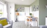 Catch up over dinner around the dining table in the open plan living space. - Thumbnail Image