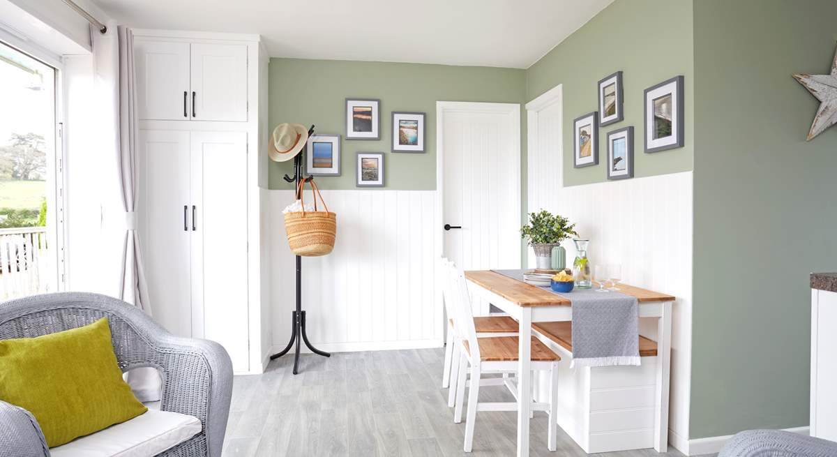 Catch up over dinner around the dining table in the open plan living space.