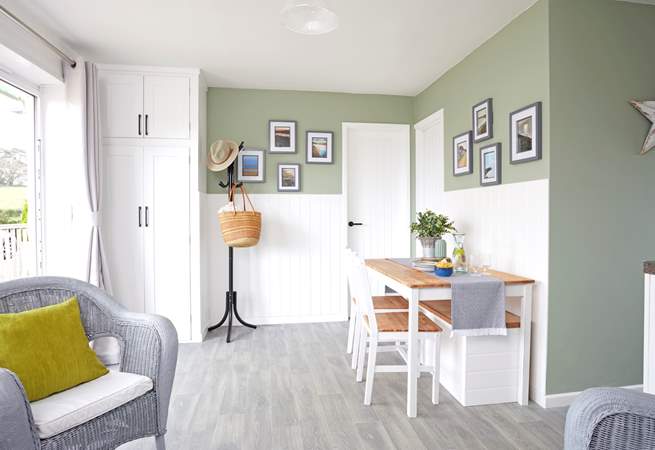 Catch up over dinner around the dining table in the open plan living space.