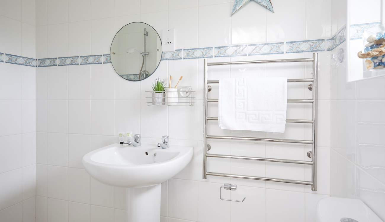 Rinse salty toes in the shower room.